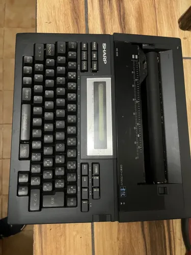 Máquina de escrever Sharp WD-1008 - Colecionador