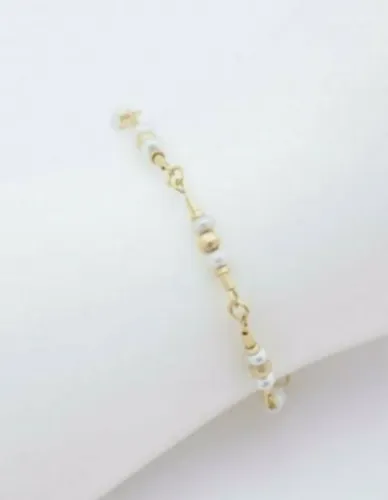 PULSEIRA EM OURO AMARELO 18K, COM PÉROLAS.