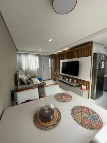Casa em Condomínio com 2 dormitórios à venda, 61 m² por R$ 550.000 - Chácara Faggion - Suz
