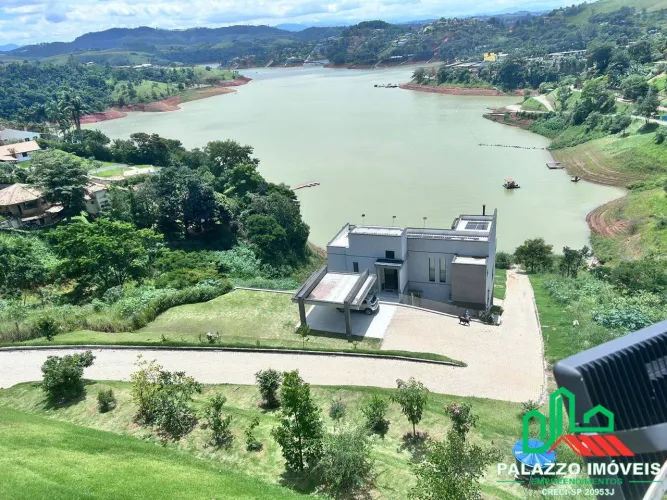 CASA EM CONDOMÍNIO ÁGUAS DE IGARATÁ FRENTE LAGO 4SUÍTES 4VAGAS 85 KM DE SP