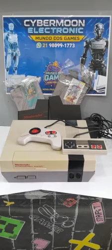 Nitendo nes + pistola + 3 cartuchos e 2 controles