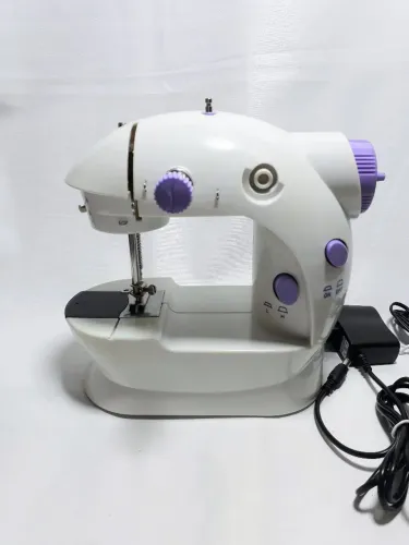 Mini máquina de costura portátil