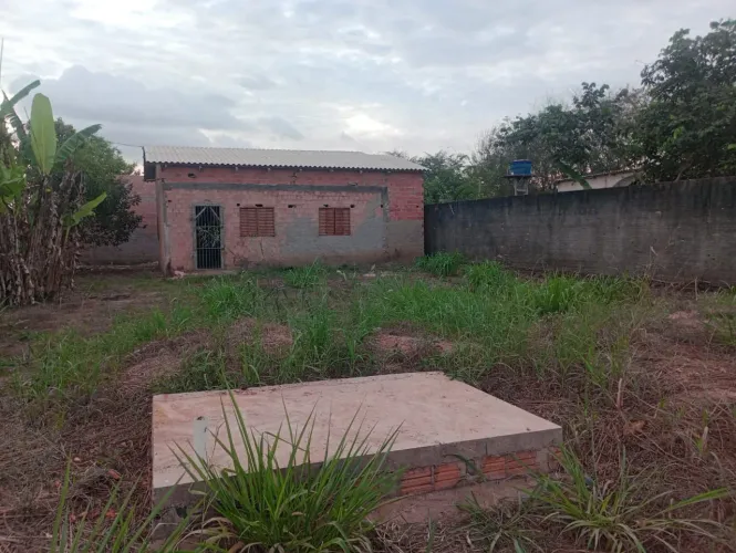 Vendo terreno com construção