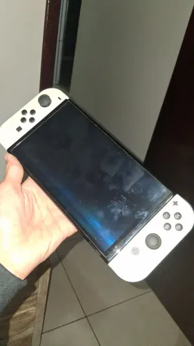 Nintendo Switch Oled usado + Rockman 11( troco por Xbox series s )