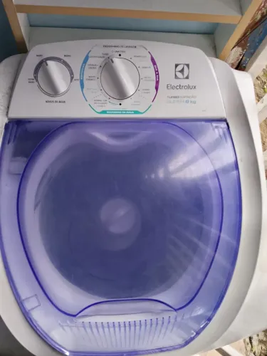 Máquina de lavar com defeito 