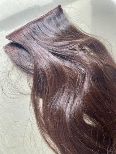 Cabelo brasileiro do sul castanho liso e sedoso