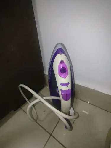 Ferro de passa a vapor
