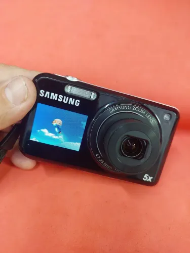 Câmera digital Samsung pl120 funcionando, *tem marca no display que não influencia em