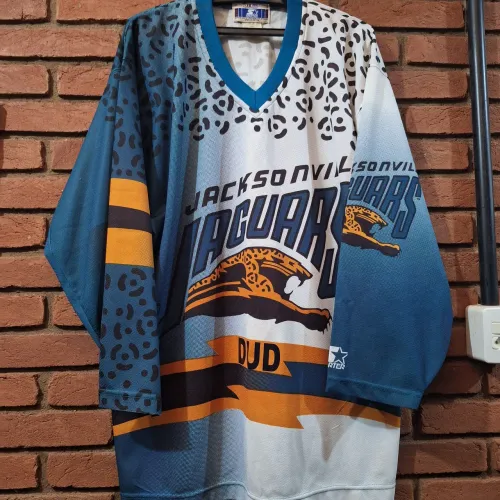 Camisa Jacksonville Jaguars - Starter estilo Hockey