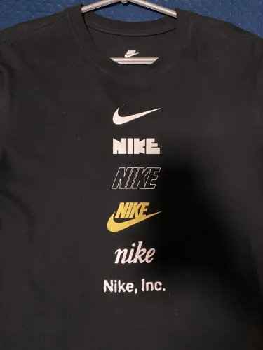 Camiseta Nike Evolução dos Logos Preta Tam.P (Original)
