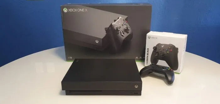 Xbox One X 1TB SSD (Super Rápido) + Caixa + Pasta termica e limpeza feita recente.<br>