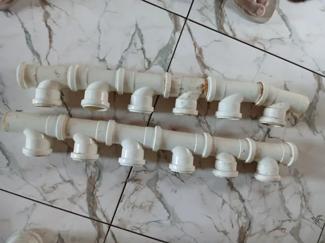 12- tubo T de 50 de esgoto $: 30 reais