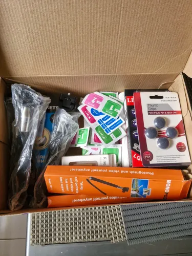 Lote de produtos de loja que faliu. Pau de selfie, Pelicula de vidro, e mais