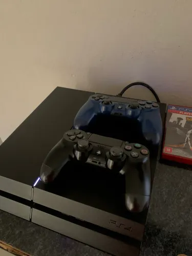 PS4 + 2 controles + Jogos