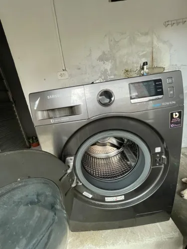 Máquina de lavar e secar