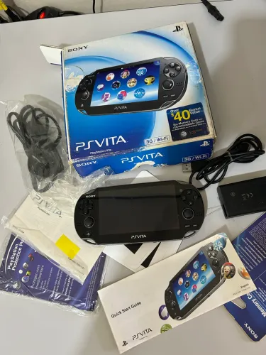 Ps vita com caixa e manuais 