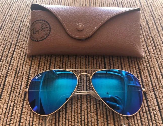 Óculos de Sol Ray-Ban Aviador - RB 3025 FRAME: Polido Ouro LENTES: Azul