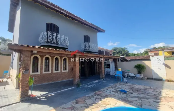 Casa em Rua Jair Dotta - Jardim do Sol - Caraguatatuba/SP