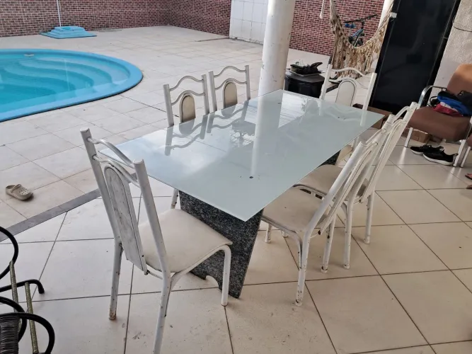 Mesa de vidro 6 cadeira usada em bom estado de uso!!