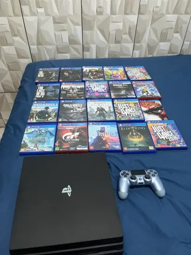 VENDO OU TROCO PS4 PRO + 16 jogos físicos