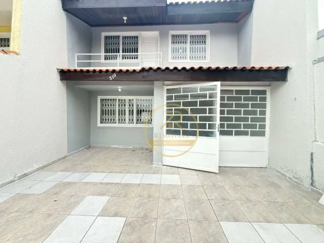 Sobrado com 3 dormitórios para alugar, 127 m² por R$ 3.458,00/mês - Uberaba - Curitiba/PR