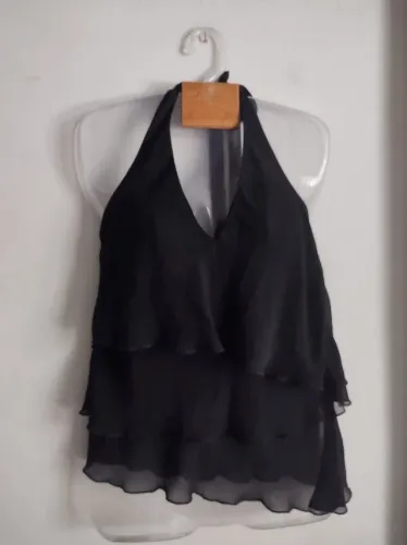 Blusa Frente única Tam médio. As duas peças por 20,00