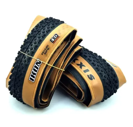 Par de Pneus 29 x 2.2" MTB Maxxis Ikon EXO Kevlar Faixa Marrom Cravos Baixos 9760