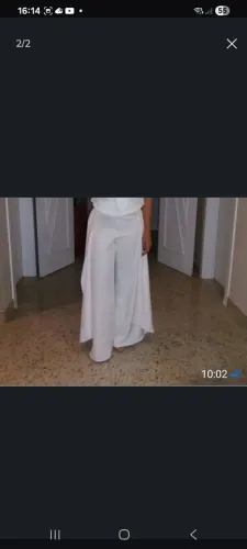 Calça alfaiataria pantalona com abertura laterak