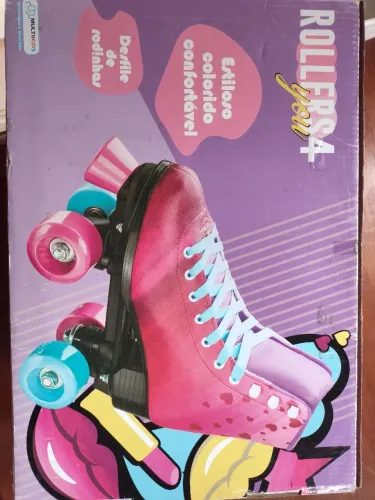 Patins rosa e uso novíssimo