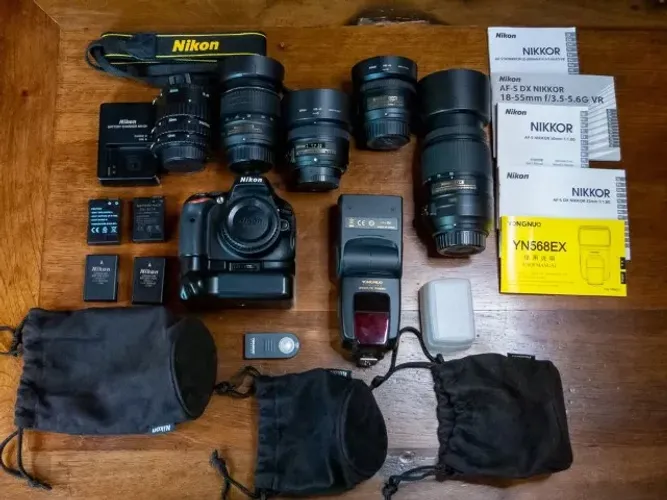 Nikon D5100 + Super Kit c/ Lentes e acessórios + tudo parece novo