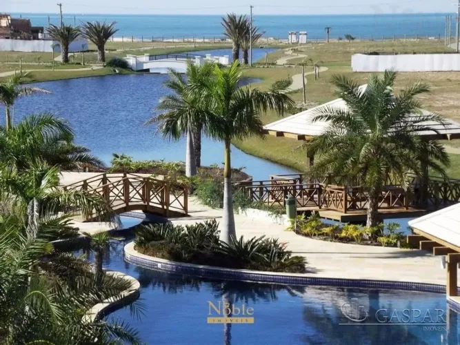 Terreno em condomínio fechado pé na área em Torres