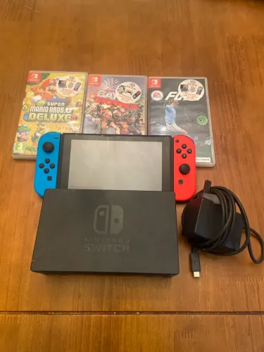 Nintendo Switch(usado) + 2 Jogos + Dock + Joy-Cons + Fonte + suporte/grip original