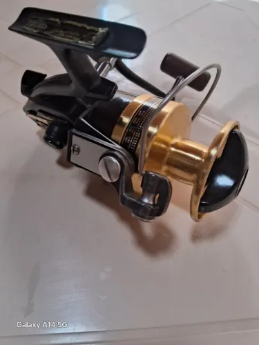 Molinete daiwa bg 90 serie ouro