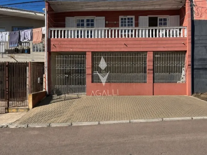 Sobrado de 4 dormitórios à venda no Novo Mundo - Curitiba