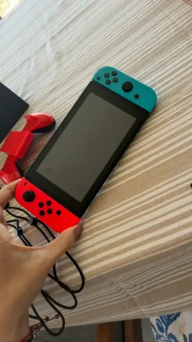 Nintendo Switch + Acessórios + Case + 2 Jogos Pokémon