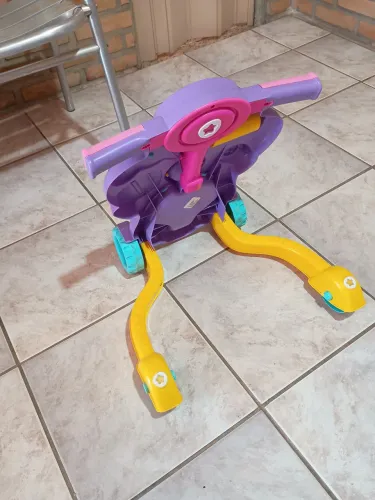 Brinquedo Bebê Piloto Tateti Calesita