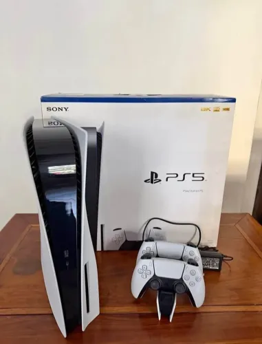 playstation 5 pouco tempo de uso, com dois controles e jogos , aceito cartão