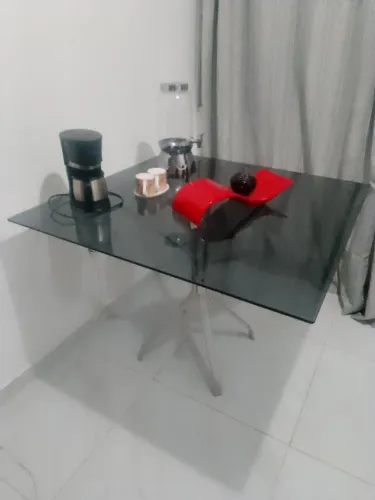 Mesa de jantar de vidro