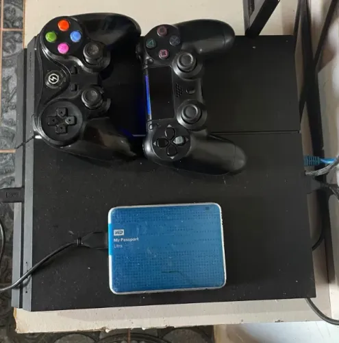 PS2 seminovo como bastante jogo com dois controles pra vender barato?