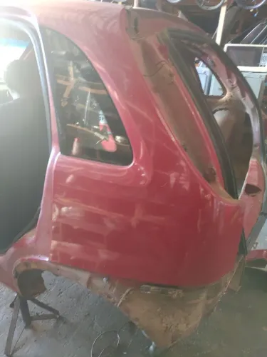 Lateral Traseira esquerda Corsa joy 