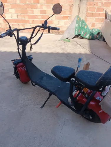 Vendo escoter elétrica tudo foncionando  emplacada 