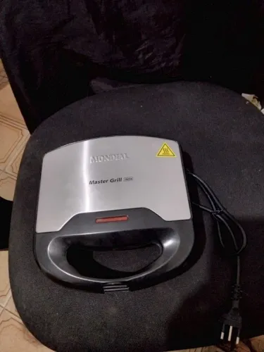 Grill Mundial Novo 90 reais