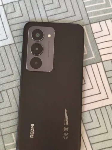 Smartphone Redimi 15 ,duas capinhas, carregador,caixa,manual