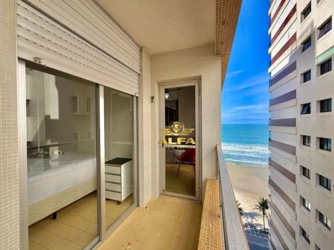 Apartamento com sacada em condomínio frente mar na Praia das Astúrias Alfa Imóveis Guaruj