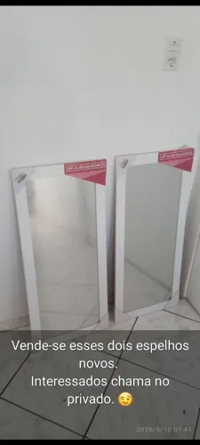 Dois espelhos novos na embalagem.