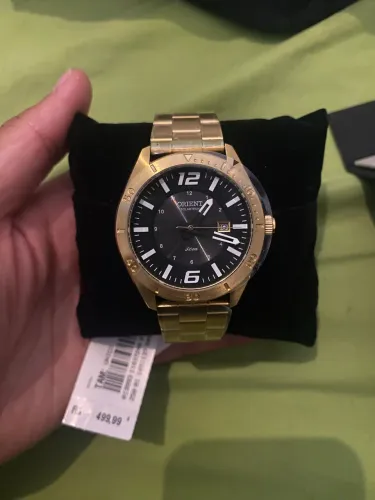 Relógio orient dourado solar tech sem uso 