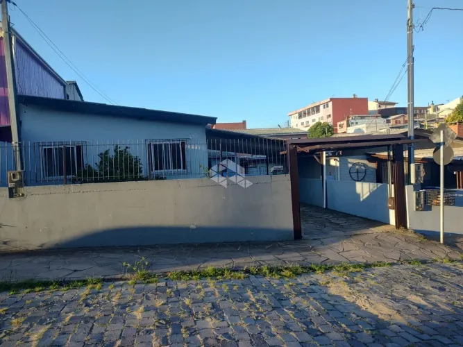 casa três quartos 3 vagas de garagem terreno amplo