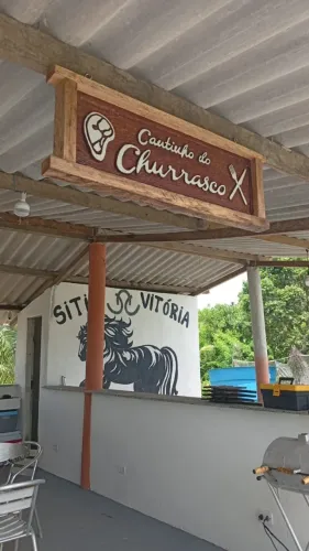 Placa em madeira de lei