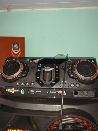 Troco por uma biz em dia, Som LG Xboom super potente 3.500rms novo.