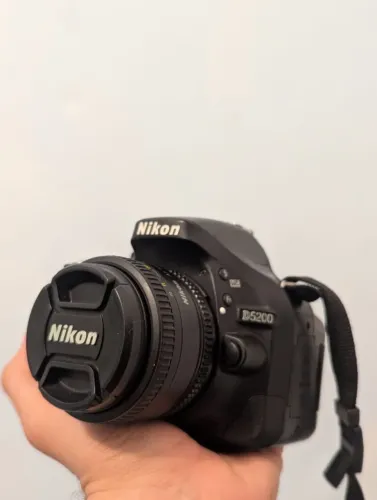 Nikon D5200 + Lente 18-55mm + Lente 50mm